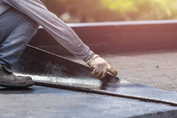 Professional Basement Waterproofing technician working in Homer, IN